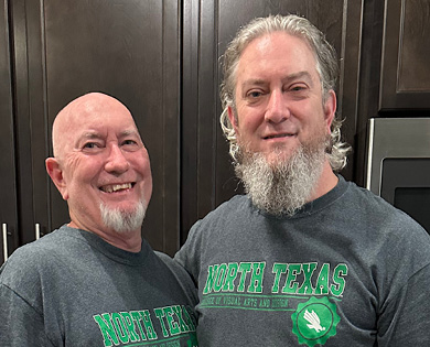 Gary, left, with his son Jason wearing gray North Texas T-shirts