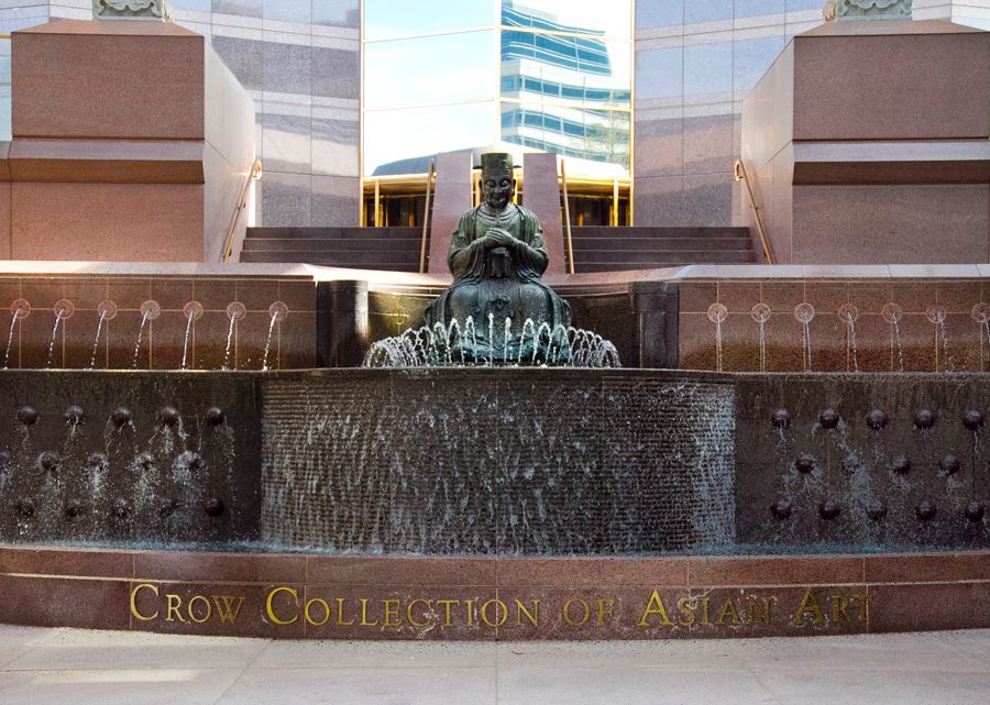 Facade of the Crow Museum of Asian Art, Dallas, an Asian statue and fountain