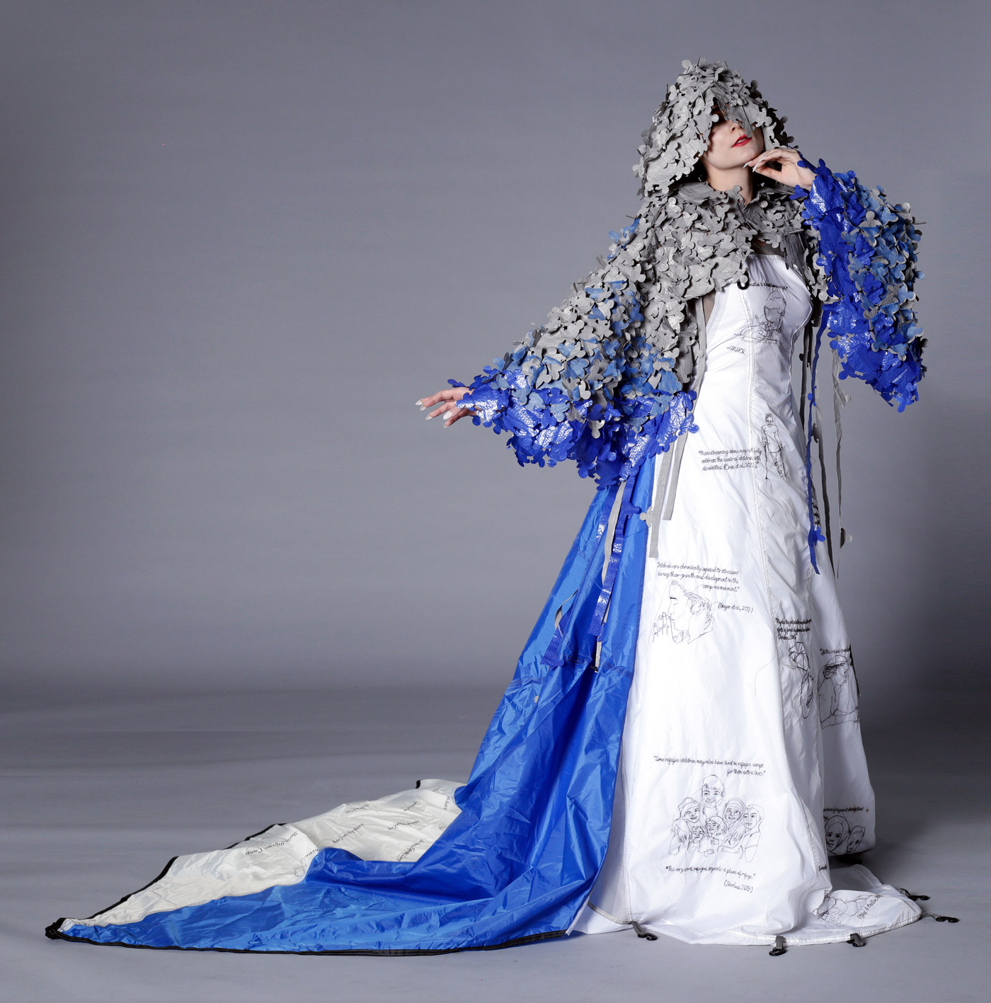 Model wearing a blue and white design by Chanjuan Chen