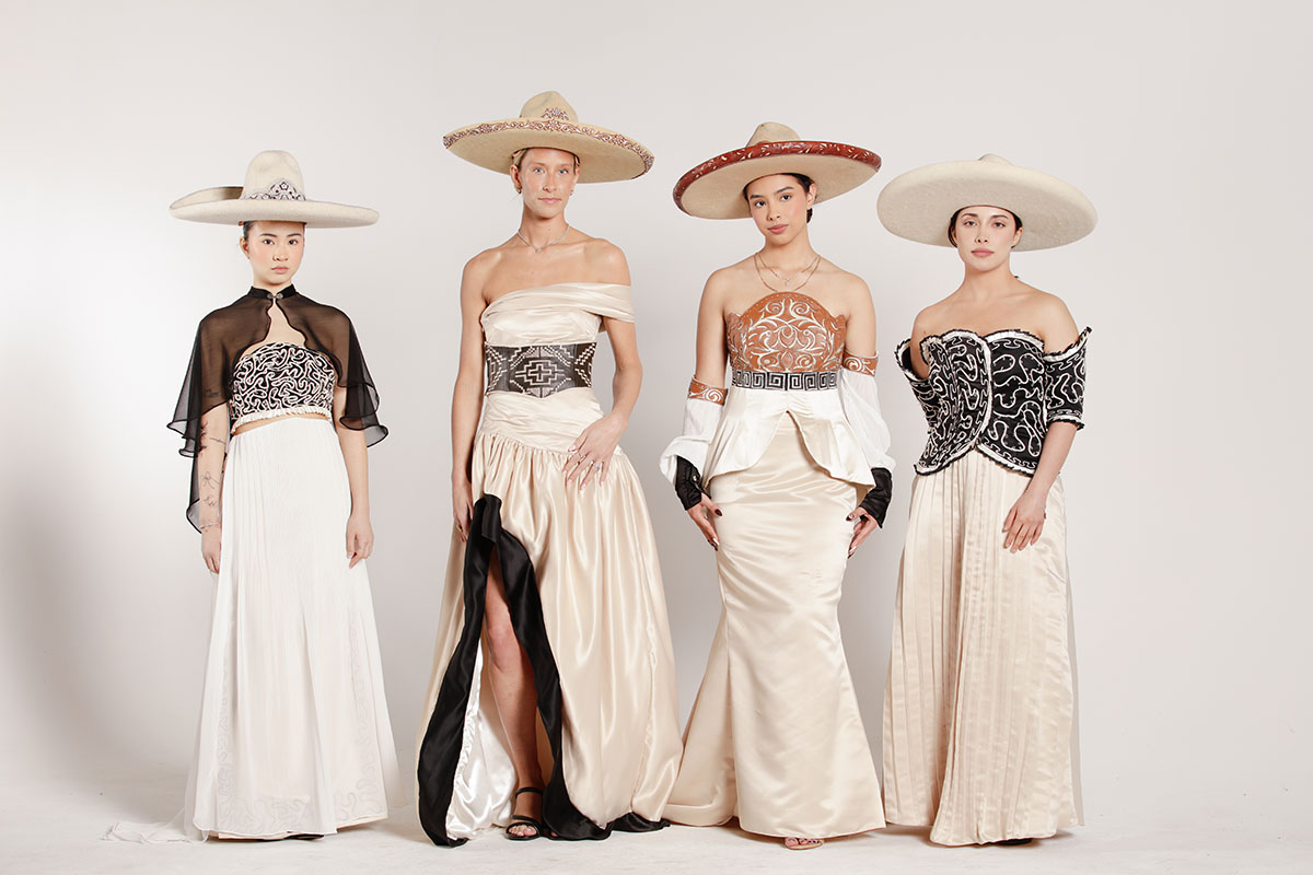 Four models stand against a white background, each wearing a satin bridal look with stitched and laser-cut details, paired with matching sombreros that reflect the surface design of each garment.