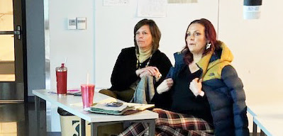 Jeannine and Cheryl seated at a desk