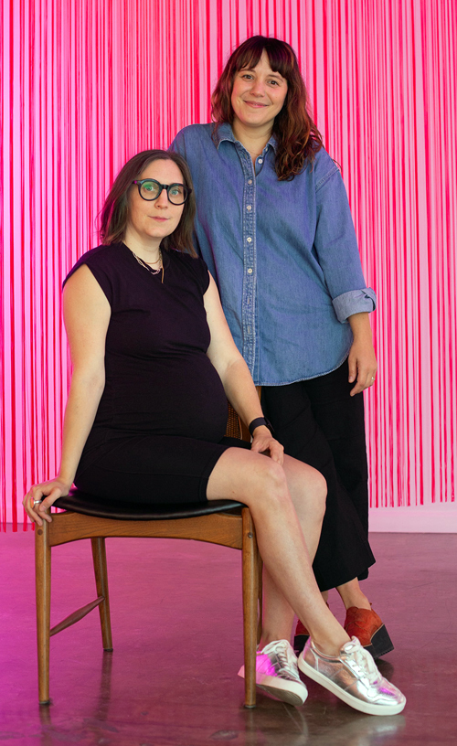 Liss LaFleur, seated, next to Katherine Sobering
