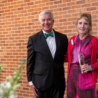 Provost Mike McPherson standing next to Elaine Pawlowicz.