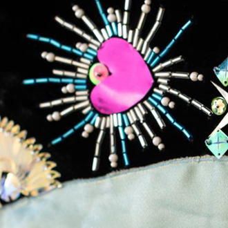 Detail of embroidery on a dress.