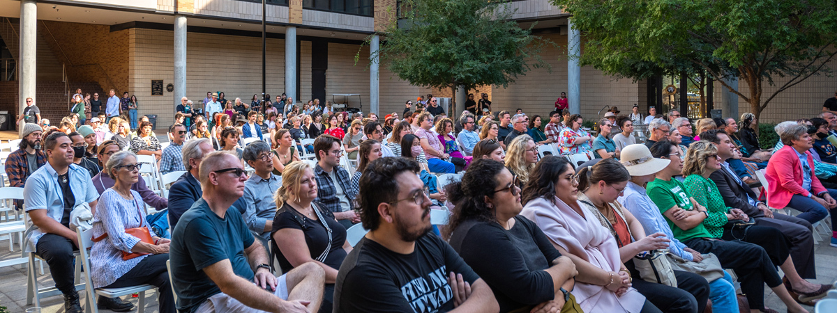 Many rows of celebrants at CVAD Celebrates! 2022 in the Art Building Courtyard.