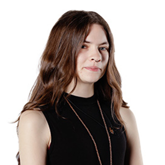 Mayzie facing forward, long brown hair, black sleeveless top