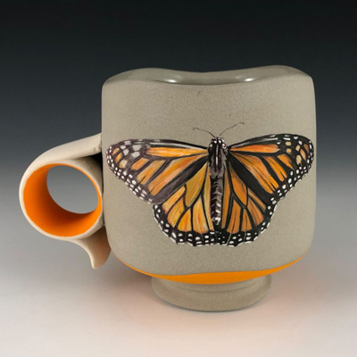 Beige up with a hand-painted Monarch butterfly
