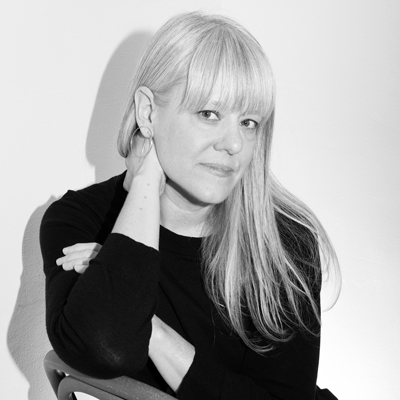 Kelli Connell, black and white photo, long light-colored hair, black top