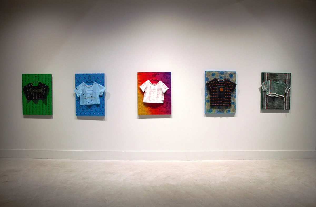 The Third-Party Pop-Up Shop exhibition image. 'Google Crop Top', left, 'iPhone Geolocations Graphic T-Shirt', 'Instagram Crop Top,' 'Spotify Crop Top,' and 'Facebook Third-Parties Crop Top'