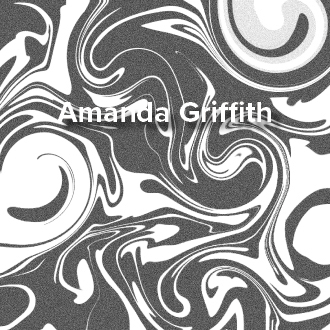 A black-and-white image of swirled paint