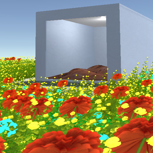 A cube-shaped building siting in a field of red and yellow flowers 