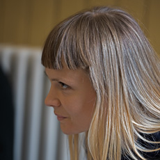 Woman in profile with long brown and blonde hair
