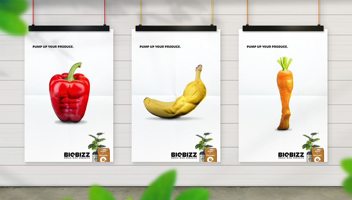 Biobizz Fertilizer ad campaign featuring vegetables and fruits combined with muscles, promoting "Pump up your produce". Images include a bell pepper with six-pack abs, a banana with a bicep, and a carrot with a calf muscle.