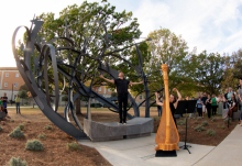 Countertenor Daniel Bubeck and harpist Ruth Mertens performing at the dedication of the "Shadow Garden" sculpture.