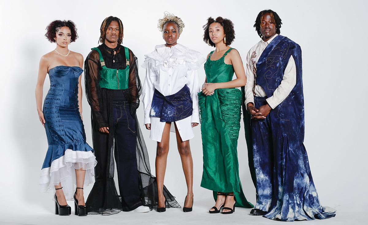 Black Renaissance collection photo that includes two male and 3 female looks.