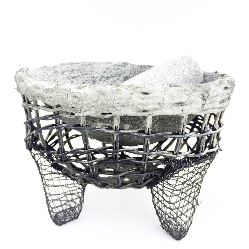 Molcajete by Westrup, a woven bowl to represent a grinding bow and pestle.